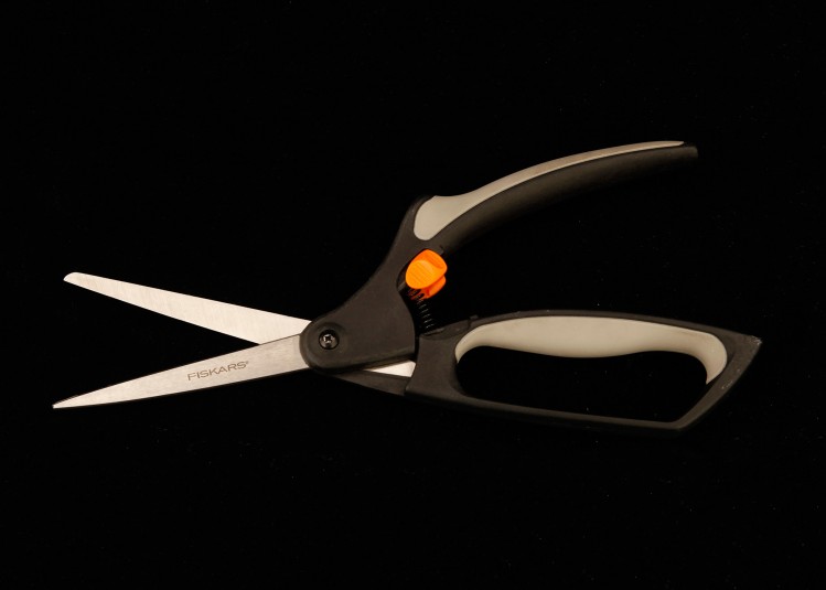 The Fiskars scissors, fully unlocked and open for cutting.