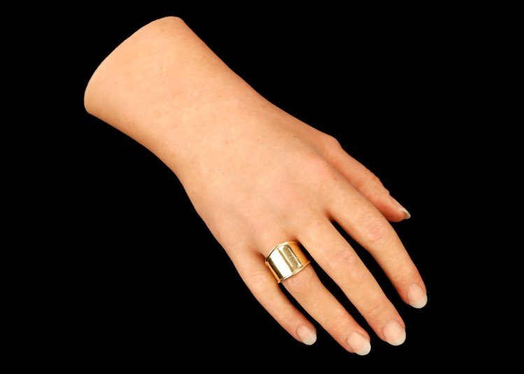 Top side of the right cosmetic hand with ring.